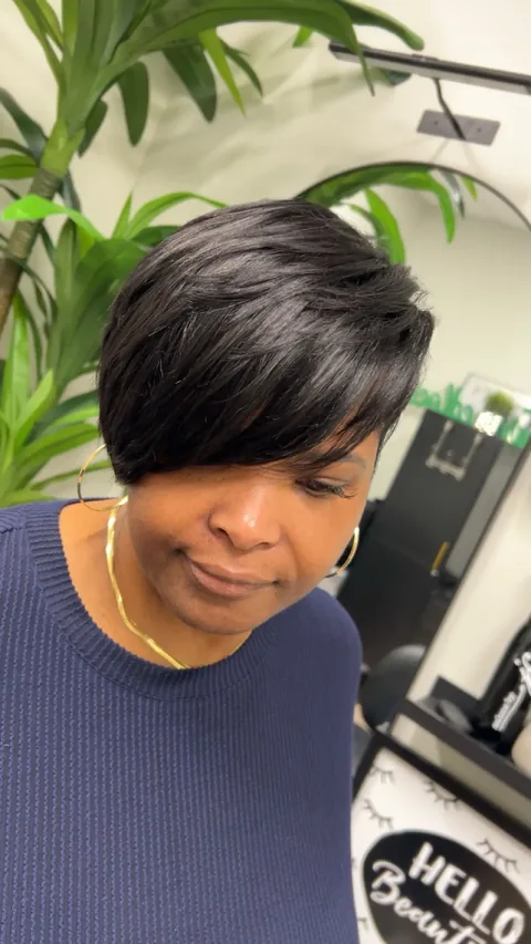 Dark short haircut with a smooth side swept fringe, supplied for the J No.5 portfolio